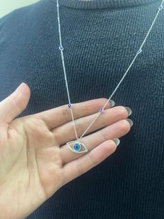 Color: rose gold, silver , gold Chain: .925 Silver Pendant width:2 centimeters Pendant height:1 centimeters Material: 925 Sterling Silver  The necklace is made of 925 sterling silver . There are small eyes on the necklaces chain. It will protectyou against evil eyes. It can be used by men or women. YOU WİLL LOWE İT..                                                                Note: if you want the pendant in larger or smaller size please let me know the size you want i will do it is best for Sterling Silver Necklaces With Diamond Eyes, Sterling Silver Evil Eye Necklaces, Dainty Silver Necklace With Evil Eye, Evil Eye Necklace Silver, Chain Necklace Women, Small Eyes, Silver Necklace Chain, Necklaces Chain, Silver Eye