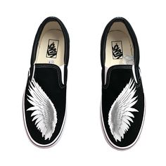 Customized Angel wing Vans Slip On Shoes for Women and Men. Unisex black Vans slip ons.  These Vans shoes have canvas uppers.  Vulcanized waffle rubber outsoles. For Men and Women.  We source each pair of shoes brand new directly from Vans.  The ink is permanent and will never come off. Made in the USA. This price includes everything: shoes, artwork, and shipping. Thanks for stopping by our Etsy shop! Please message us with any questions! Sizes listed are in US sizing scale. If you have any issues with your order, please feel free to reach out to us and we will be more than glad to help you! Note: Blvd Custom is in no way affiliated with any of the shoe brands or companies that are featured on our website. Each pair of shoes is ordered lawfully bought at retail price. Custom Slip-on Skateboarding Sneakers With Rubber Sole, Custom Slip-on Sneakers For Skateboarding, Shoes Artwork, Slip On Shoes For Women, Vans Slip Ons, Vans Slip On Shoes, Black Vans, Vans Slip On, Shoes Brand