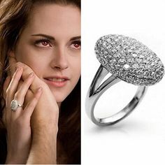 a woman wearing a ring with diamonds on it and an image of her hand next to the ring