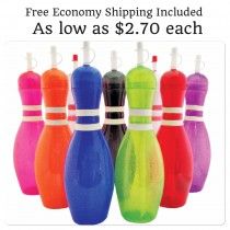 the colorful bowling pins are lined up against each other