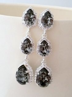 Smokey gray black diamond LONG Chandelier earrings, Drop earrings, Dangle earring Silver or Gold Swarovski, Bridal earrings, Bridesmaid giftTHIS IS "TINE ELDOR'S JEWLERY" ORIGINAL DESIGN!!THESE STUNNING EARRINGS CAN BE CUSTOM MADE WITH CUSTOM COLORS AND METAL PALTING. PLEASE CONTACT ME.Stunning beauty.These earrings are so romantic.  They would be great for bridal wedding or with evening dress. Perfect gift for bridesmaids or any other occasion.They are made of silver palted brass and Swarovski Elegant Gray Jewelry With Matching Earrings, Gray Dangle Jewelry For Party, Gray Drop Earrings For Party, Gray Dangling Jewelry For Parties, Elegant Gray Earrings For Wedding, Gray Dangle Jewelry With Matching Earrings, Black Dangle Chandelier Earrings For Wedding, Silver Bridal Earrings, Long Chandelier