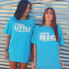 two young women wearing matching t - shirts with the words finding little big on them