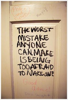 a door with writing on it that says the worst mistake anyone can make is being too afraid to make one