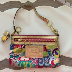 Looks Brand New. See Pictures. Multicolor Coach Pouch Bag, Coach Multicolor Rectangular Bag, Multicolor Rectangular Coach Shoulder Bag, Multicolor Rectangular Coach Bags, Multicolor Retro Coach Bag, Multicolor Coach Bag With Zipper Closure, Multicolor Coach Crossbody Bag, Coach Multicolor Bag With Detachable Strap, Coach Multicolor Clutch Bag