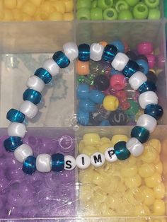 the beads are arranged in different shapes and sizes to spell out some type of word