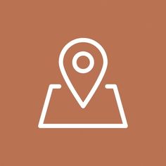 a map pin icon on a brown background