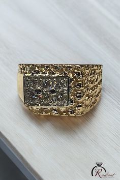 Mems  vintage diamond nugget ring Created in 13.21 grams of 14 karat yellow gold. Featuring 6 round natural diamonds approximately 0.80 Ctw SI clarity & near colorless diamonds.  Features a smooth high polish design on one side with a retro nugget pattern on the opposite.   Size 11 Can be sized 1 size up/down at no charge.   Please allow an extra 3-4 days for turnaround.   Comes in a gift box with appraisal upon request. Polish Design, 21 Grams, Colorless Diamond, Ring Band, Vintage Diamond, Rings Statement, Band Rings, Favorite Jewelry, Statement Rings