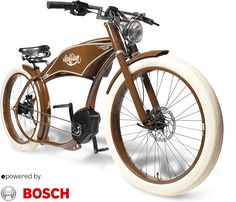 a brown and white bicycle is shown with the words, powered by bosch on it