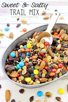 a large metal pan filled with trail mix