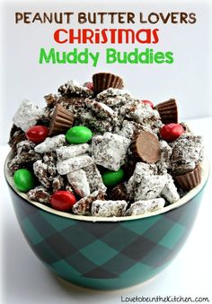 a bowl filled with christmas muddy buddies next to a sign that says peanut butter lovers