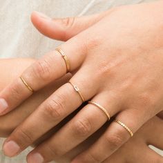 The Dainty Baguette Ring is effortlessly elegant, yet dainty enough to wear every day. You can dress it up or down; whether it’s a stroll in the sand or an evening in the city, this sweet ring is sure to make you feel gorgeous. DETAILS 14k gold vermeil -or- sterling silver ring 1mm band with cubic zirconia stone Sizes 5-8 available Matching necklace: Dainty Baguette Necklace Solitaire Ring Stack, Love Knot Ring, Dot Ring, Solid Gold Bracelet, Flower Band, Baguette Ring, Diamond Jewelry Necklace, Solid Gold Necklace, Ring Stack