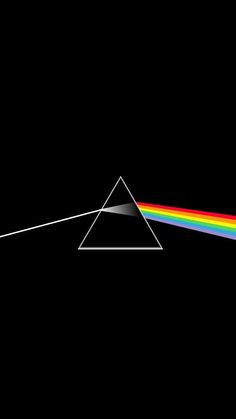 the dark side of the moon with a rainbow in it