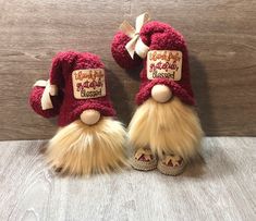 two red and white slippers with fuzzy fur on them sitting next to each other