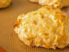 some biscuits are sitting on a cookie sheet