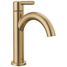 a gold faucet on a white background