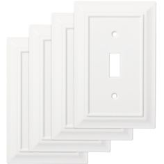 five white wall plates with one single light switch plate on each side and the other three