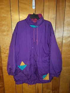 Vintage Southern Classics Womens Windbreaker Jacket Reversible as seen Snap Button Closure pockets on sides both ways 1990s Fashion *D2 in the title is for my storage reference* Size: Tag says - One Size Fits All Measurements: when item is Flat on table Pit to Pit (Across Chest): roughly 28" Length (Top of Collar to Hem): roughly 34" Bottom of Sleeve Hem to Shoulder: roughly 20.5'' Bottom of Sleeve Hem to Neck: roughly 30'' Material: polyester, cotton Color: Purple or Pink Condition : The item i 90s Style Long Sleeve Purple Outerwear, Retro Purple Windbreaker For Fall, 90s Style Purple Long Sleeve Outerwear, Purple Long Sleeve 90s Outerwear, Retro Purple Windbreaker For Winter, 90s Style Winter Windbreaker With Pockets, Vintage Purple Hooded Outerwear, Retro Purple Outerwear For Winter, Retro Purple Winter Outerwear