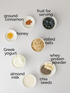 the ingredients to make blueberry oatmeal are shown in small bowls