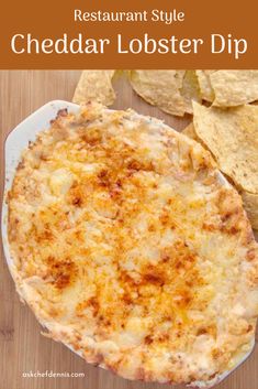 an image of a cheddar lobster dip with tortilla chips on the side