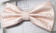 Beautiful silk pre tied and adjustable double tiered banded bow tie. Will adjust from 13" through 20" neck. Bow dimensions 2.5" x 4.5". Elegant Pink Bow For Black Tie Events, Elegant Pink Bow Tie For Suits, Elegant Pink Adjustable Bow Tie, Elegant Adjustable Pink Bow Tie, Elegant Pre-tied Ties For Wedding, Neck Bow, Jan 20, Bow Ties, Pocket Square