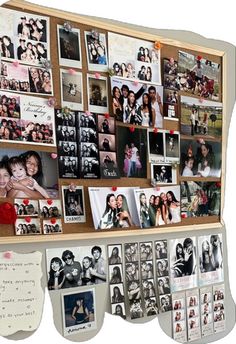 a wooden display with pictures and photos on it