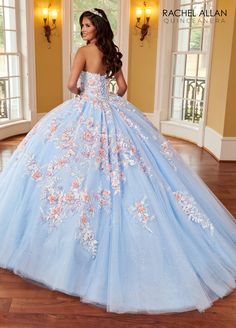 Look super cute in this 3D floral applique long cape sleeve dress with A-line skirt by Rachel Allan RQ2161. Glitter tulle quinceanera ball gown with strapless sweetheart neckline, detachable streamers, embroidery applique, 3D flowers, beads, lace-up back closure, and sweep train. 3D Floral Cape Sleeve Quinceanera Dress by Rachel Allan RQ2161 Rachel Allan La Reina Collection: Spring 2023 Style Number: RQ2161 Fabric: Tulle, Glitter Tulle, Sequin Beading, Embroidery, 3D Flowers Please note: There m Floral Cape, Cape Sleeve Dress, Rachel Allan Prom Dresses, Mary's Bridal, Embroidery 3d, Cinderella Divine, Quince Dress, Strapless Sweetheart Neckline, Dresses Quinceanera