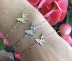 Beautiful butterfly bracelets in all 3 colors Perfect for all ages-sterling silver -gold platedComes with an extensionCheck out the matching necklaces in my other listing!!** in the "letter to seller" section please include your email address!free shipping in the US!!! If you have questions please don't hesitate to ask. Happy shopping!!! Dainty Adjustable Jewelry With Butterfly Clasp, Dainty Silver Butterfly Bracelets, Silver Dainty Butterfly Bracelets, Dainty Butterfly Charm Bracelets As Gifts, Dainty Butterfly Charm Bracelet Gift, Butterfly Charm Bracelet Jewelry Gift, Dainty Butterfly Charm Bracelets For Gift, Rose Gold Adjustable Jewelry With Butterfly Charm, Delicate Adjustable Jewelry With Butterfly Charm