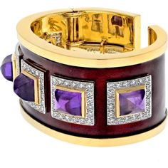 Indulge in the realm of refined elegance and groundbreaking design with the David Webb Platinum & 18K Yellow Gold Bastille Sugarloaf Amethyst Red Enamel Diamond Cuff Bracelet. A true masterpiece of fine jewelry, this cuff bracelet is a testament to exquisite artistry and unparalleled attention to detail.At its heart lies a magnificent sugarloaf amethyst, radiating a rich, regal purple hue that is both captivating and luxurious. Weighing an impressive carats, this gemstone is skillfully showcased within a bezel setting, accentuating its size and brilliance.Surrounding the amethyst are round brilliant-cut diamonds that add a mesmerizing touch of glamour to the design. These diamonds glisten and sparkle, enhancing the overall allure of the bracelet.Crafted with a combination of platinum and 1 Luxury Gemstone Bracelets, Luxury Yellow Gold Cuff Bracelet With Gemstone, Formal Fine Jewelry Cuff Bracelet With Gemstone, Fine Jewelry Gemstone Cuff Bracelet For Formal Occasions, Formal Gemstone Cuff Bracelet, Luxury Polished Cuff Bracelet, Luxury Polished Cuff Bangle, Formal Gemstone Cuff Bracelet In Bangle Shape, Designer Polished Finish Cuff Bracelet For Formal Occasions