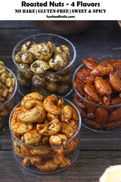 four bowls filled with nuts sitting on top of a wooden table next to another bowl full of nuts