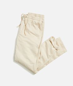 Saturday Stretch Beach Pant Summer Chinos With Elastic Waistband, Summer Straight Leg Chinos With Elastic Waistband, Summer Ankle-length Cargo Pants For Loungewear, Chic Summer Parachute Pants With Tapered Leg, Spring Vacation Relaxed Fit Cargo Pants, Chic Tapered Leg Parachute Pants For Summer, Summer Beige Ankle-length Chinos, Summer Relaxed Fit Chinos, Summer Relaxed Fit High-waisted Chinos