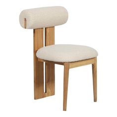 a wooden chair with a white cushion on the back and seat pad in front of it