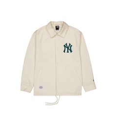 a white jacket with the new york yankees embroidered on it's chest and sleeves