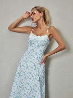 The Ilsa Spaghetti Floral Maxi Dress in Blue is a breathtaking display of beauty and charm. With its delicate spaghetti straps and vibrant floral pattern, it exudes a sense of feminine grace and elegance. The flowing maxi length adds an ethereal touch, making it an ideal choice for special occasions or summer soirées where effortless glamour is desired. Material: 100% Polyester Invisible zipper opening at the back Stretch Factor: Non Stretch Clean: Gentle machine wash Color may vary due to the l Shapewear Tops, Jumpsuits And Romper, Feather Dress, Maxi Dress Green, Embellished Dress, Shop Maxi Dresses, Prom Party Dresses, Wedding Party Dresses, Bandage Dress