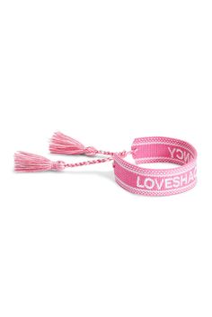 a pink lanyard with the word love on it and two tassels attached to it