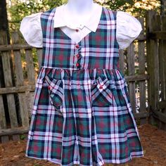 Vintage 50's 60s Girls Macdonald Plaid Cotton School Church Dress Size 5 What A Wonderful Dress! Macdonald Plaid In Red, Green, Ivory & Black Cotton Faux 'Vest' Bodice W/ Decorative Red Buttons On A Arrow Shape Faux White 'Blouse' Under Vest (No Top Button, Doesn't Appear To Have Had One) Short Puff Sleeves 2 Front Pockets W/ Triangle Top & Red Button Belt Loops (No Belt) Full Skirt Unlined No Label Very Good Condition, Appears Unworn Chest: 25" Waist: 25" Hip: Free Length: 21" Shoulder To Shoul Vest Bodice, Retro Kids Clothes, 60s Outfits, Vintage Kids Fashion, 60s Girl, Faux Vest, Church Dress, Kid Clothes, Church Dresses