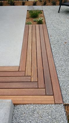 a wooden deck is laying on the ground