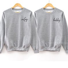 Wifey Sweatshirt, Bridal Shower Gift, Couples Shirts, Engagement Gift, Couples Sweatshirts,Gifts For Couples, Bride Gifts, Hubby Sweatshirt ♥ABOUT OUR SWEATSHIRTS: Uptown Studio Designs uses a unisex Gildan brand sweatshirt. This unisex sweatshirt is preshrunk and has a classic fit. Consider ordering your regular size for a standard fit or size up if you want a roomier option. A sturdy and warm sweatshirt bound to keep you warm in the colder months.. It's soft, stylish, and perfect for the coole Hubby Sweatshirt, Hubby Wifey Shirts, Wifey Sweatshirt, Couples Shirts, Gifts For Couples, Couples Sweatshirts, Bridal Shower Gift, Branded Sweatshirts, Couple Shirts