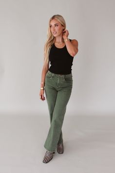 Super high rise wide hem straight leg jeans. It's the jolly fit that sits slightly lower on the waist and fitted easy & straight from the hip to mid thigh. Full inseam on stretch denim accented with wide waistband & double button closure, side seam panel inserts, washed for softness in designer color palettes, tailored center inseam press, wide hem band finish. 11" Front Rise (include waistband), 19 1/2" Leg Opening, 30" inseam (Size 27) SUPER STRETCH: Plenty give, may go down one size 90% COTTO Corset Tank Top, Semi Cropped, Elevated Basics, Color Palette Design, Black Tank Top, Wide Waistband, Black Tank, Black Tank Tops, Modern Woman