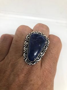 Large genuine blue Lapis Lazuli Vintage ring Low content silver not sterling. Size 9 Can be re sized. My jeweler charges $10-$20 All rings are shipped free in the US in a nice gift box. Check out our over a THOUSAND great reviews Engraving is $4 per letter and is not always perfect depending on the piece. It can take a few days if the jeweler is busy. This is payable to Paypal Judithsltd@gmail.com Nickel-free Blue Open Ring Jewelry, Adjustable Blue Rings With Large Stone, Nickel Free Blue Rings For Jewelry Making, Adjustable Blue Stamped 925 Jewelry, Blue Lapis Lazuli, Lapis Lazuli Ring, Blue Lapis, Blue Band, Vintage Ring