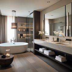 a bathroom with a tub, sink and large mirror in the corner next to it