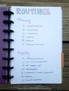 a notebook with the words routine written on it