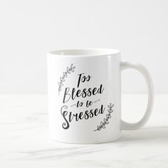 a white coffee mug with the words to be kissed is shown