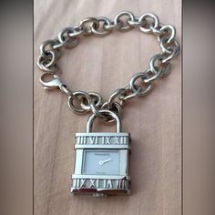 Like-New!Tiffany & Co Atlas Lock Swiss Watch Charm Link Bracelet Sterling Silver. Comes With Original Box And Dust Bag Timeless Jewelry And Watches With Jubilee Bracelet As Gift, Timeless Jubilee Bracelet As A Gift, White Gold Watch With Clasp As Gift, Timeless Jubilee Bracelet Jewelry And Watches As Gift, Designer White Gold Jewelry And Watches As Gifts, Timeless Jewelry And Watches As Gifts, Silver Watch As A Gift, Silver Watches Suitable For Gifts, Timeless White Gold Jewelry With Palladium Hardware