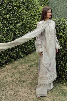 Brand: QalamkarProduct Code: PS-11 RINNAHCollection: Qalamkar Unstitched Festive Lawn CollectionFabric: Lawn DESIGN DETAILS: Shirt Laser Cut Embroidered (Front Center Panel) Chikan kari Embroidered (Front Side Panels) Embroidered hem (Front Center) Embroidered Front Neckline Embroidered Border (Front, Back & Sleeves) Embroidered Lace (Front ,Back & Sleeves) Embroidered Patch (Front & Back) Chikan kari Embroidered Back Chikan kari Embroidered Sleeves Embroidered Border (Sleeves) Dupatta Digital Printed Silk Dupatta Trouser Plain Trosuer Fabric Details Shirt : Lawn Dupatta :Silk Trouser : Cotton DISCLAIMER:* Lining, Laces, and Tassels are not included in unstitched variants.* Embellishment items in stitched outfits are subject to market availability.* The actual colors of the outfit may vary