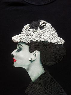 an image of a woman with a hat on top of her head and red lips