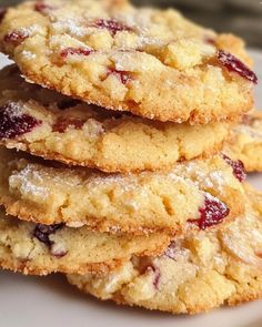 a stack of cookies sitting on top of a white plate