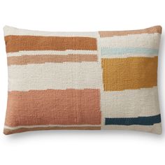 an orange, white and blue pillow on a white background with multicolored stripes