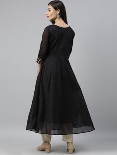 Stunning solid black chanderi cotton partywear kurta online on Inddus at best price. Black mirror embellished anarkali kurta with floral lace inserts, has a v-neck, tie-up detail, three-quarter sleeves, and flared hem. Anarkali Kurta, Lace Insert, Black Mirror, Three Quarter Sleeves, Anarkali, Three Quarter, Solid Black, Floral Lace, Neck Tie