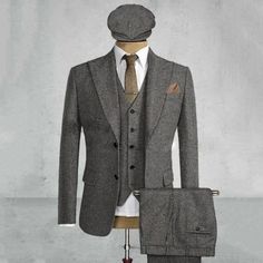 Step into timeless elegance with our Men's 3-Piece Tweed Herringbone Suit - a stunning homage to the iconic style of Peaky Blinders and Tom Shelby. Immerse yourself in the sophistication of high-quality craftsmanship and design that captures the essence of the show. Peaky Blinders Inspired: Embrace the charisma of Tom Shelby with our meticulously crafted suit, mirroring the distinctive Peaky Blinders aesthetic. Tweed Herringbone Design: The suit features a classic herringbone pattern in premium tweed, adding a touch of vintage charm and modern appeal. High-Quality Craftsmanship: We take pride in delivering exceptional quality, ensuring that each piece reflects the highest standards of craftsmanship. 3-Piece Ensemble: Elevate your wardrobe with this complete set, including a jacket, vest, a Winter Fitted Tweed Three-piece Suit, Classic Winter Three-piece Suit For Work, Winter Tweed Three-piece Fitted Suit, Winter Tweed Three-piece Suit, Dapper Tailored Winter Suit, Winter Formal Tweed Three-piece Suit, Classic Three-piece Fall Suit, Classic Fitted Three-piece Suit For Winter, Classic Herringbone Suit For Semi-formal Occasions