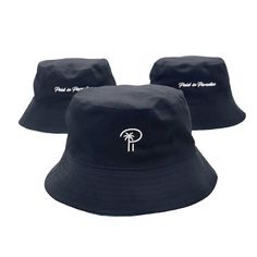 Featuring our paradise signature logo with black background and our “Isla” print on reverse, this lightweight reversible hat is designed for sunny days and stylish nights. Wide brim blocks sun in day-time Black or multicolor option for night-time Paradise Signature logo + P Logo on other side Lightweight fabric, sweat-wicking, and quick-drying Reversible! Flip inside out for two different looks In stock, ships next day. PRODUCT DETAILS Size Guide Model is wearing size XL Material and Care ▪️ Rev Black Lightweight Bucket Hat For Vacation, Black Reversible Hat For Streetwear, Black Reversible Bucket Hat With Curved Brim, Black Curved Brim Sun Hat For Streetwear, Black Flat Brim Bucket Hat For Vacation, Reversible Black Bucket Hat For Beach, Black 5-panel Summer Hat, Black Reversible Sun Hat With Curved Brim, Adjustable Black 5-panel Sun Hat